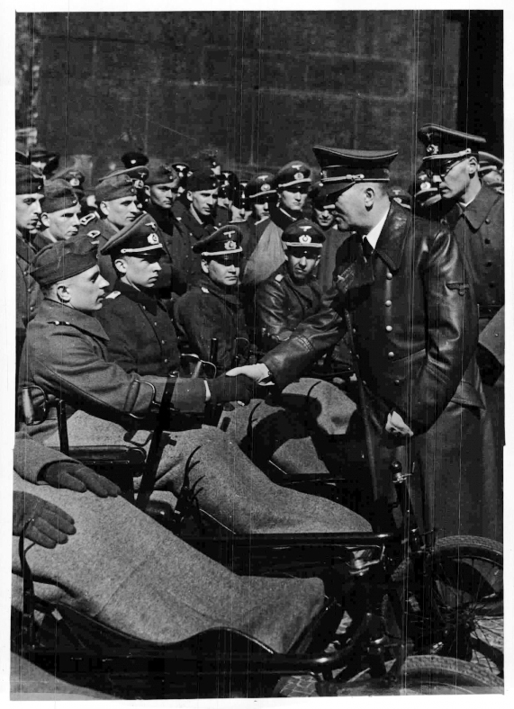 Adolf Hitler greets wounded soldiers during the Heldengedenktag (Heroes Memorial Day) in Berlin